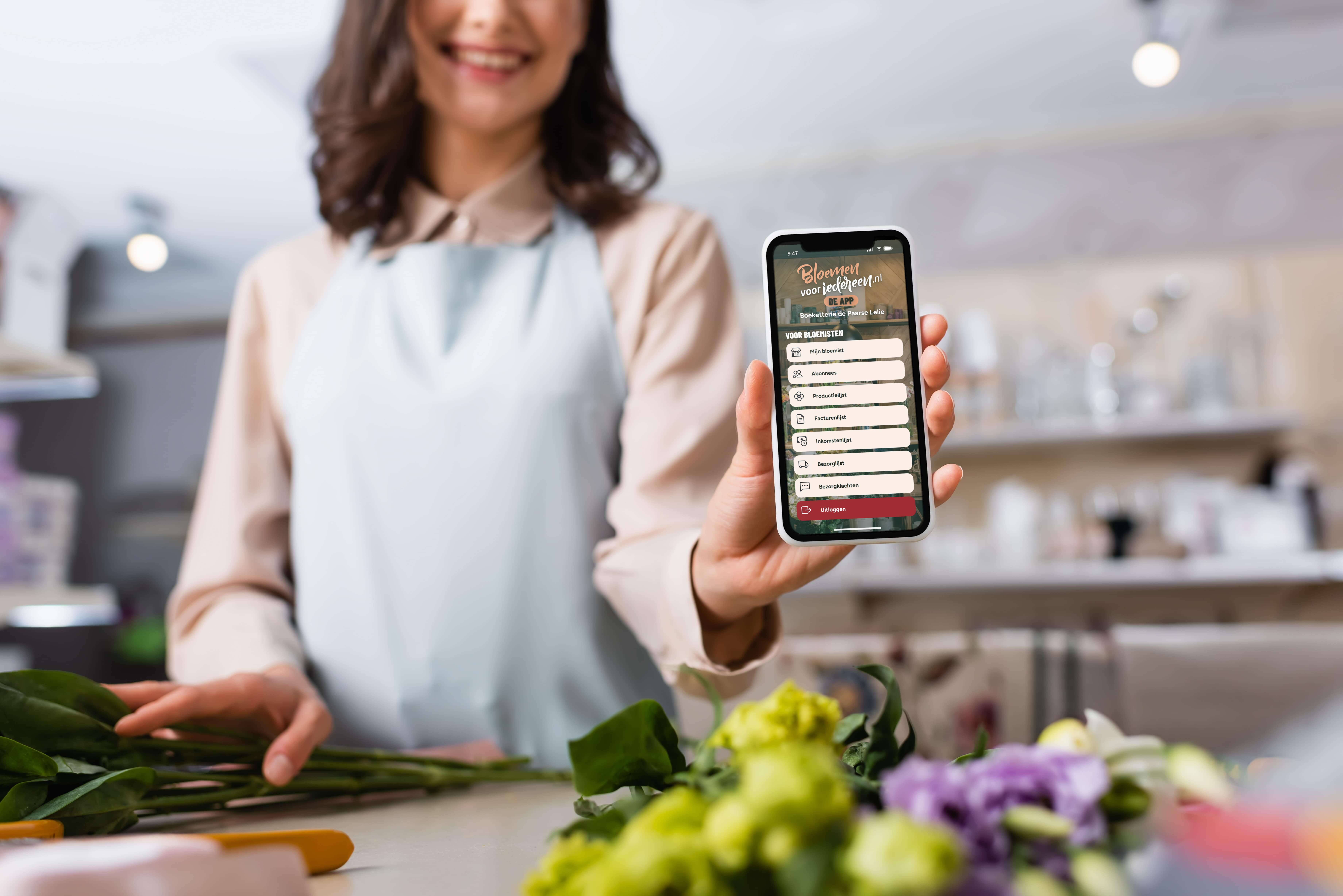 Bloemist toont een app op een smartphone